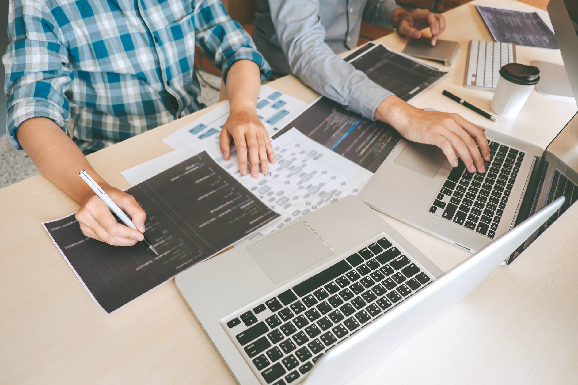 Software Developers Using Laptop